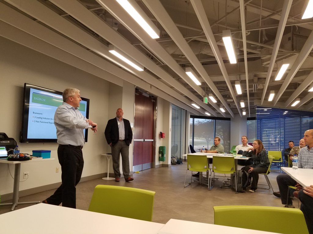 Michael and Jake introducing the group exercise for lean portfolio management